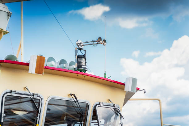 two chrome ship sirens and set of loudspeakers on the top of the cabin - industry szczecin europe nautical vessel imagens e fotografias de stock