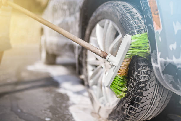 istock Car Washing with soap. Cleaning Car Using High Pressure Water. 1287501382