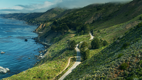 Aerial shot of the famous Big Sur coast on a sunny summer day in California.