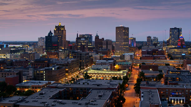 istock Third Ward and Downtown Milwaukee Lit Up at Dusk - Aerial 1287509392