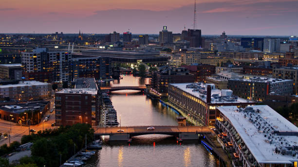istock River Flowing Through Milwaukee's Historic Third Ward at Dusk - Aerial 1287509395