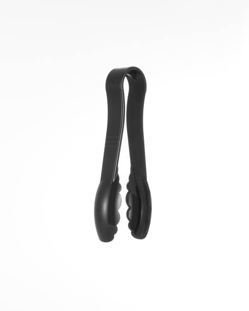 istock Black Plastic Salad Tongs isolated on white 1287510271