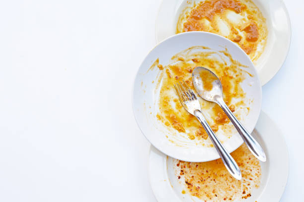 istock Dirty dishes on white background. Top view 1287518337