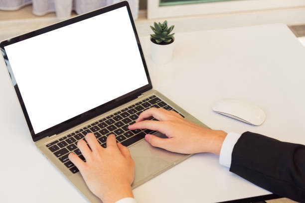istock Businessman wearing suit video conference call by laptop computer 1287521135