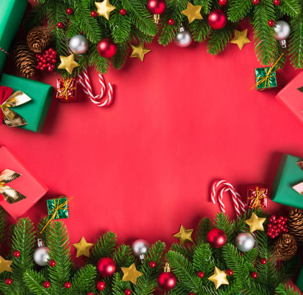 istock green fir tree branches and decoration gift box 1287521219