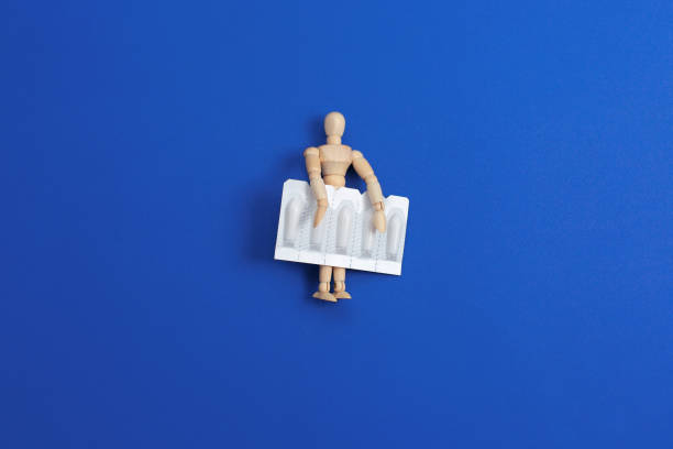 istock Medical Suppository, Rectal or Vaginal. Isolated on blue Background. 1287521254