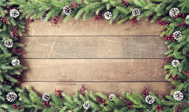 istock Christmas Garland on an Old Wood Background 1287522033