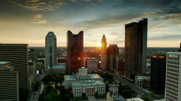 Ohio Statehouse and Columbus Office Buildings at Sunset - Aerial Aerial establishing shot of the Ohio Statehouse in Columbus at sunset. columbus stock pictures, royalty-free photos & images