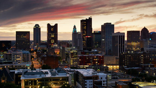 Aerial View of Downtown Columbus Lit Up at Twilight Aerial shot of Downtown Columbus after sunset, including the Ohio Statehouse. ohio ohio statehouse columbus state capitol building stock pictures, royalty-free photos & images