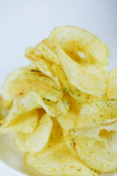 istock Potato chips dried seaweed salt, close up 1287524865
