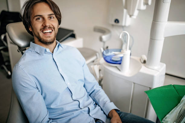 istock Young men in visit to dentista 1287527893