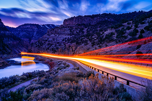 Glenwood Canyon Interstate 70 Colorado at Night - Time exposure of automobiles moving through going eastbound and westbound.