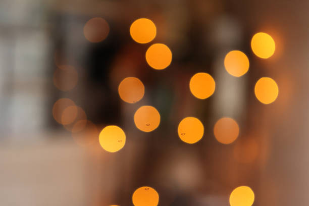 istock Multicolored colorful bokeh lights on abstract dark background. 1287532491