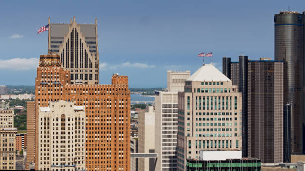 istock Upper Section of Detroit Skyscrapers with River Beyond 1287534394