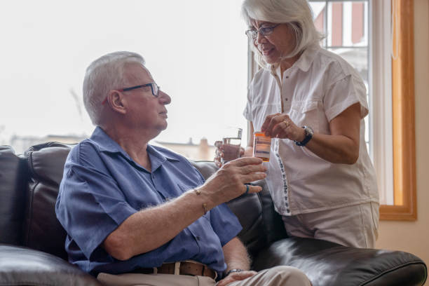 istock Senior male taking medication 1287537960