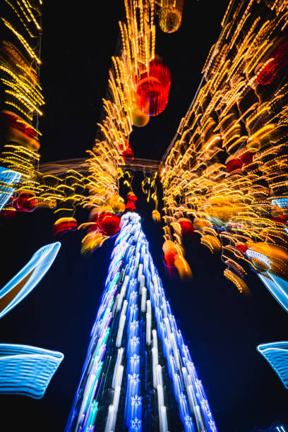 istock Christmas tree with garlands of lights. 1287538060