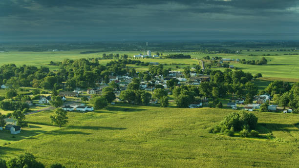 istock Aerial View Across Cornfield Towards Small Ohio Town 1287538702