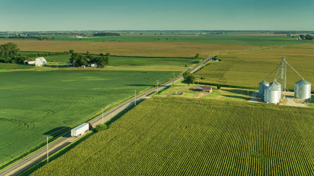 istock Truck on Country Road Through Ohio Cornfields - Aerial 1287538716
