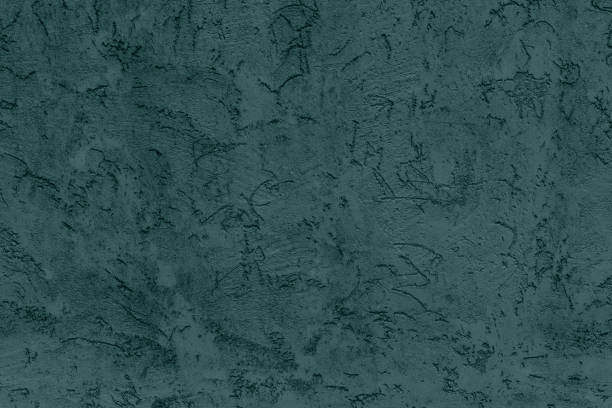 istock dark green colored low contrast Concrete textured background 1287540766
