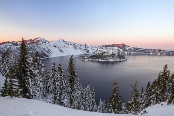 istock Beautiful winter sunset at Crater Lake 1287548440