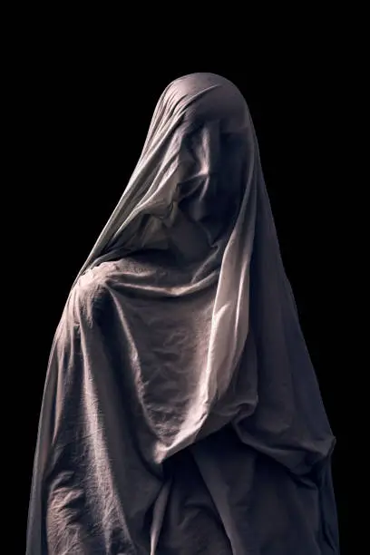 Portrait of a scary ghost isolated on black background