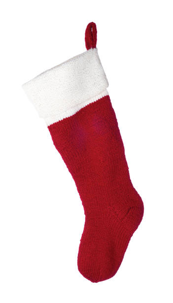 istock Red Christmas decoration sock isolated on white background. 1287550550