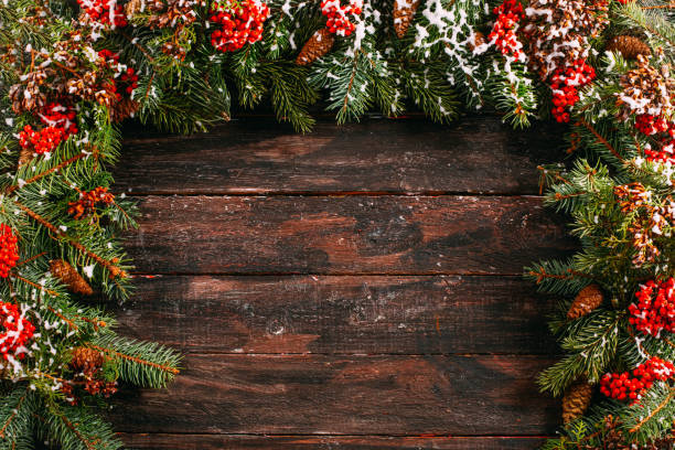istock Flat Lay Christmas Decoration on a Rustic Wooden Table 1287550828