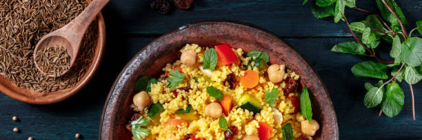 istock Couscous overhead flat lay panorama with ingredients 1287551722