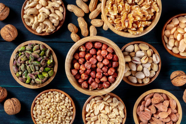 istock Nuts variety flat lay. Many different nuts, shot from the top 1287551934