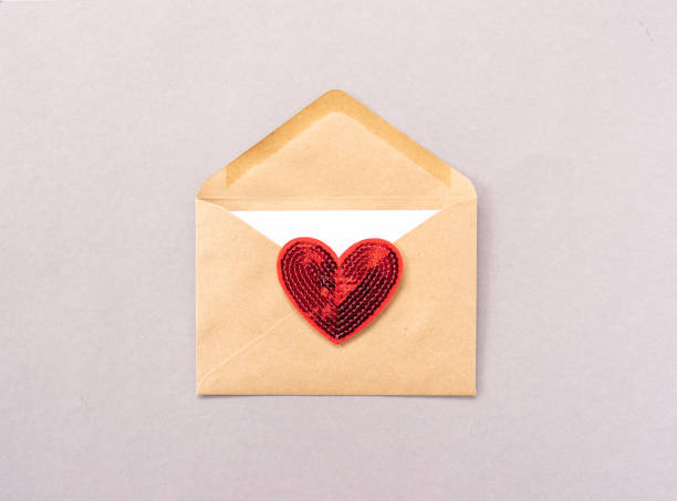 istock A red heart lies on a brown envelope for Valentines Day 1287553221