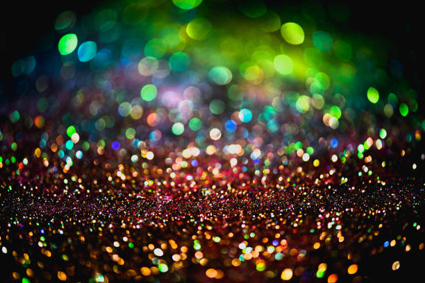 istock bokeh effect glitter colorful blurred abstract background for birthday, anniversary, wedding, new year eve or Christmas 1287554052