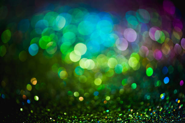 istock bokeh effect glitter colorful blurred abstract background for birthday, anniversary, wedding, new year eve or Christmas 1287554224