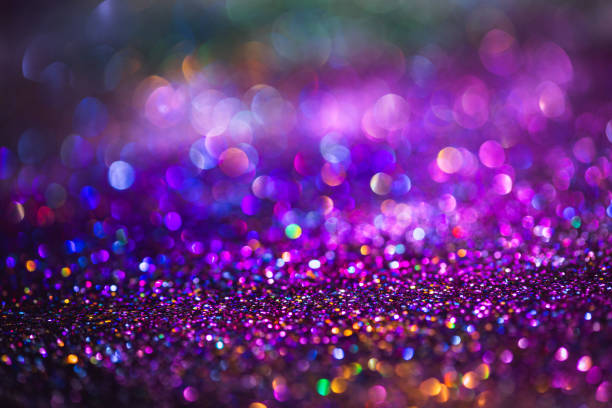 istock bokeh effect glitter colorful blurred abstract background for birthday, anniversary, wedding, new year eve or Christmas 1287554413