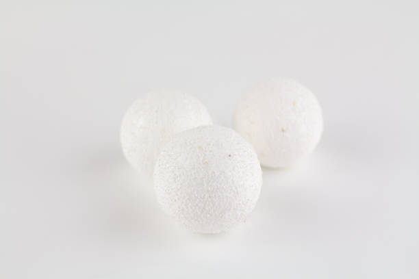 istock white snow balls on the christmas tree 1287556628