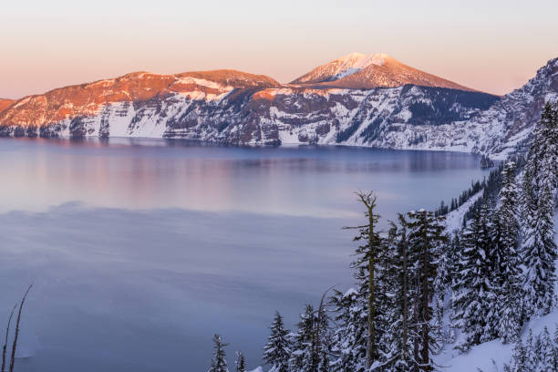 istock Crater lake in winter sunset 1287556891