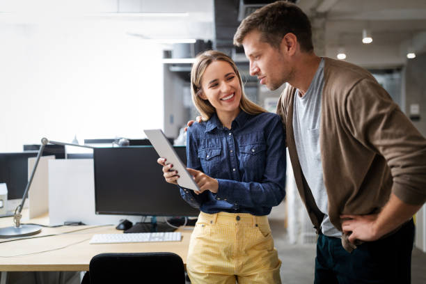 istock Creative professional designers brainstorming in office. Business, design, work, idea concept 1287556975