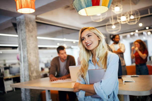 istock Business people brainstorming and chatting at workplace office 1287557002