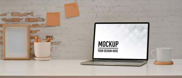 istock Workspace with laptop, stationery, decorations and copy space in home office room 1287558884