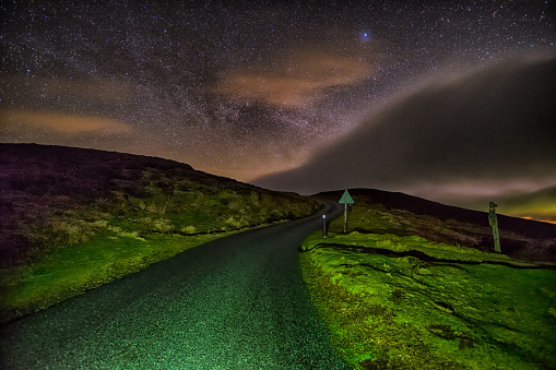 night sky in countryside with minor road
