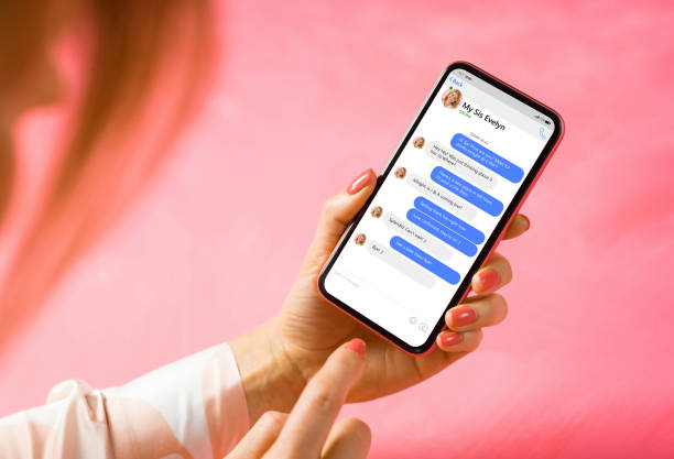 istock Woman using messaging app on mobile phone 1287563653