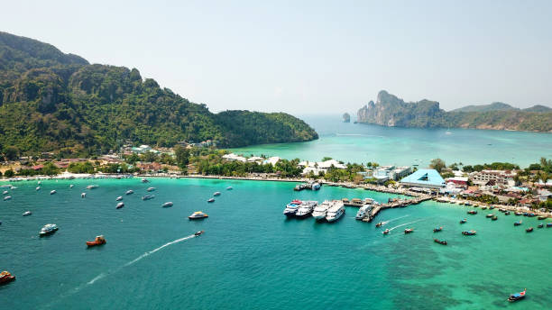istock Turquoise clear water. Yachts, boats floating 1287565025