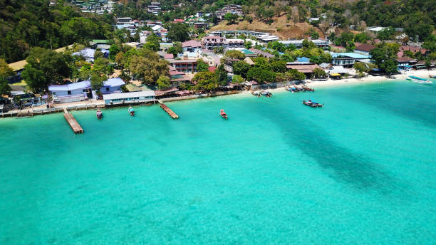 istock Turquoise clear water. Yachts, boats floating 1287565074