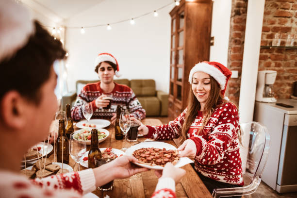 istock people celebrate the christmas at home 1287566364