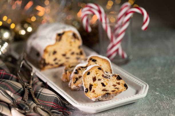 istock Christmas stollen on wooden background. 1287566635