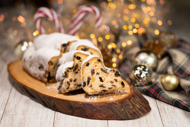 istock Christmas stollen on wooden background. 1287566660