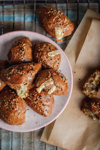 Homemade Pastries with Sesame Seeds.  Turkish pogaca (pastry) made with einkorn flour.