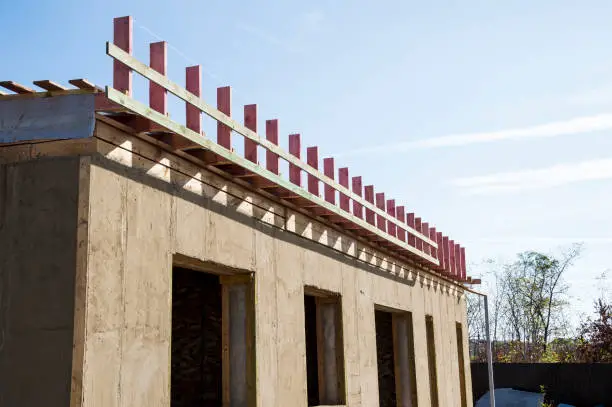 Photo of Construction of the roof gable. Wooden formwork.