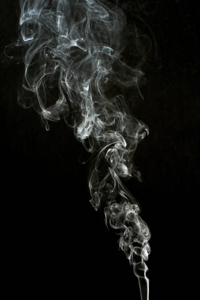 istock smoke cloud with black background. fog texture 1287568800