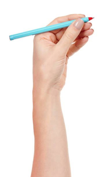 istock Hand with blue writing pen isolated on white background. 1287569736