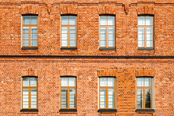 istock Beautiful vintage red brick building at sunny day 1287572599